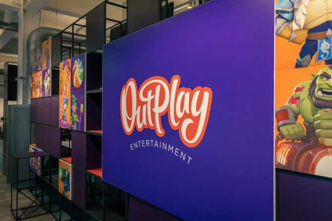 Office space with Outplay Logo
