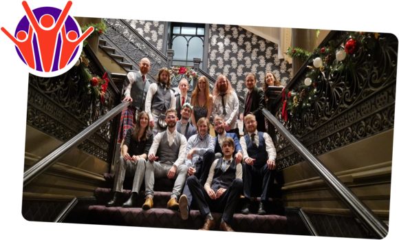 People in suits on a staircase